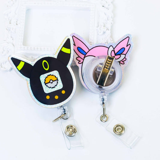 Two holographic badge reels, glitter acrylic cartoon character retractable clip