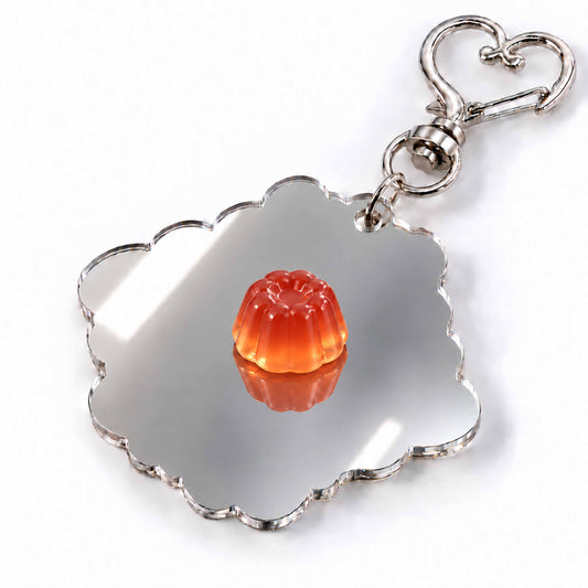 Back view of a custom mirrored acrylic keychain with metal hardware; product photo on a white background.
