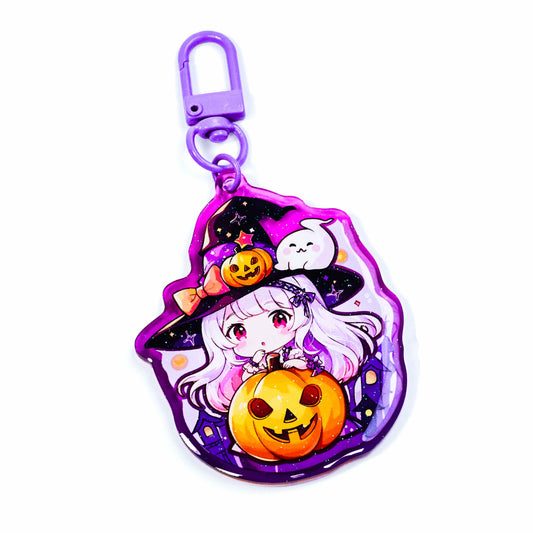 Custom-colored-acrylic-keychains-with-an-anime-style-witch-theme