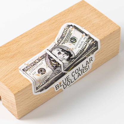 Banknote shaped fragile sticker, torn peeling texture, placed on light wood block