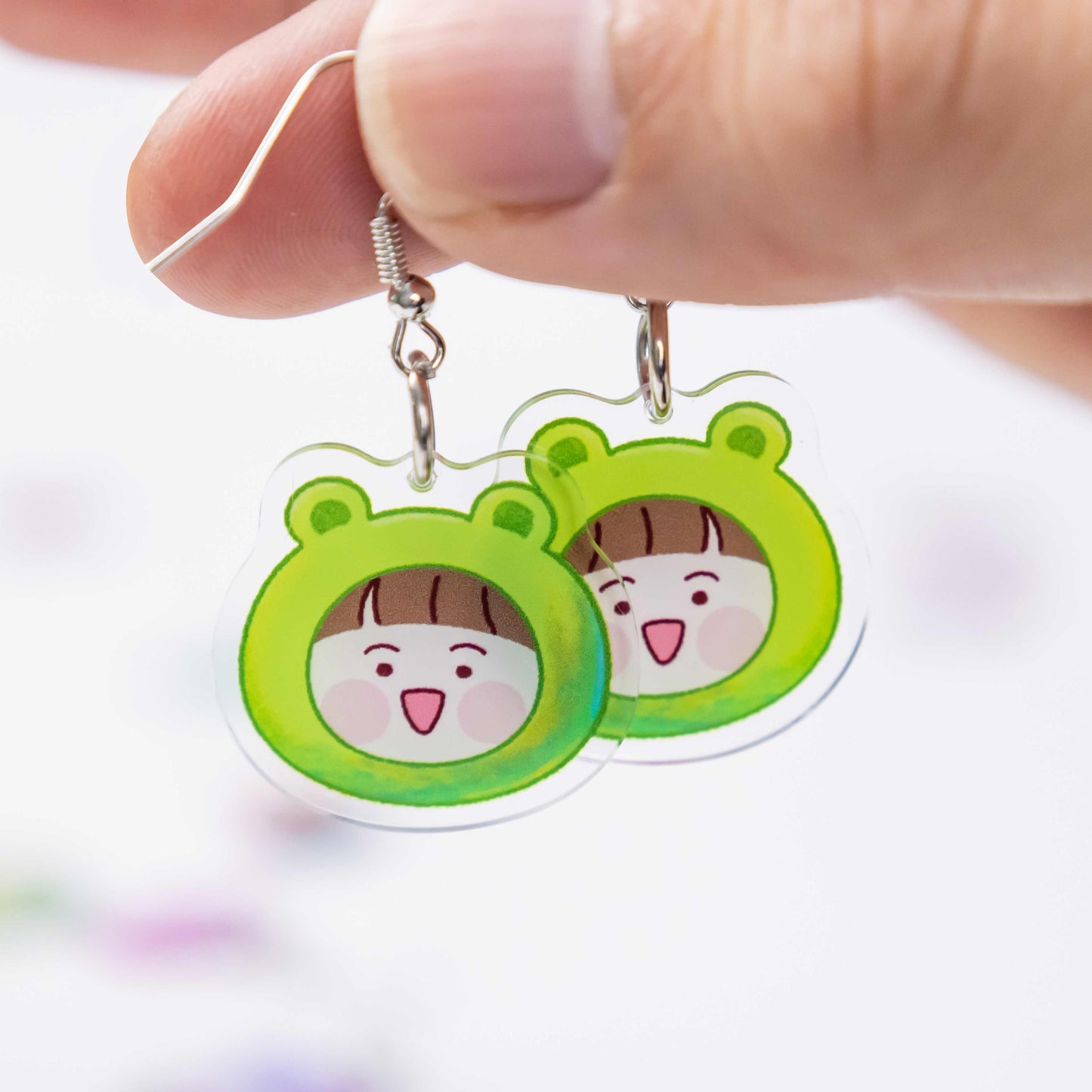Personalized acrylic earrings with custom artwork for brands and creators
