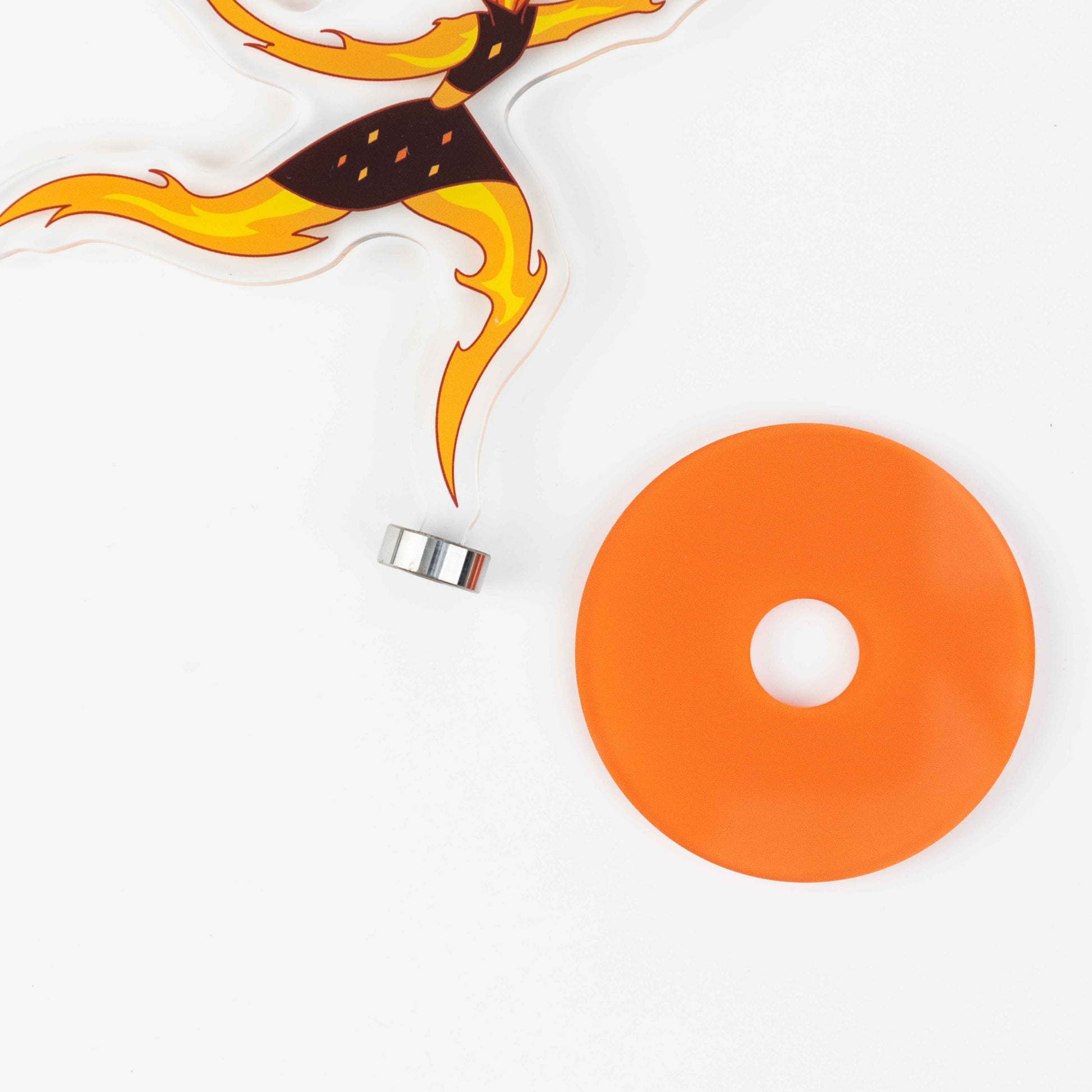 Disassembled rotating acrylic standee parts, character cutout, metal swivel and orange acrylic base flat display