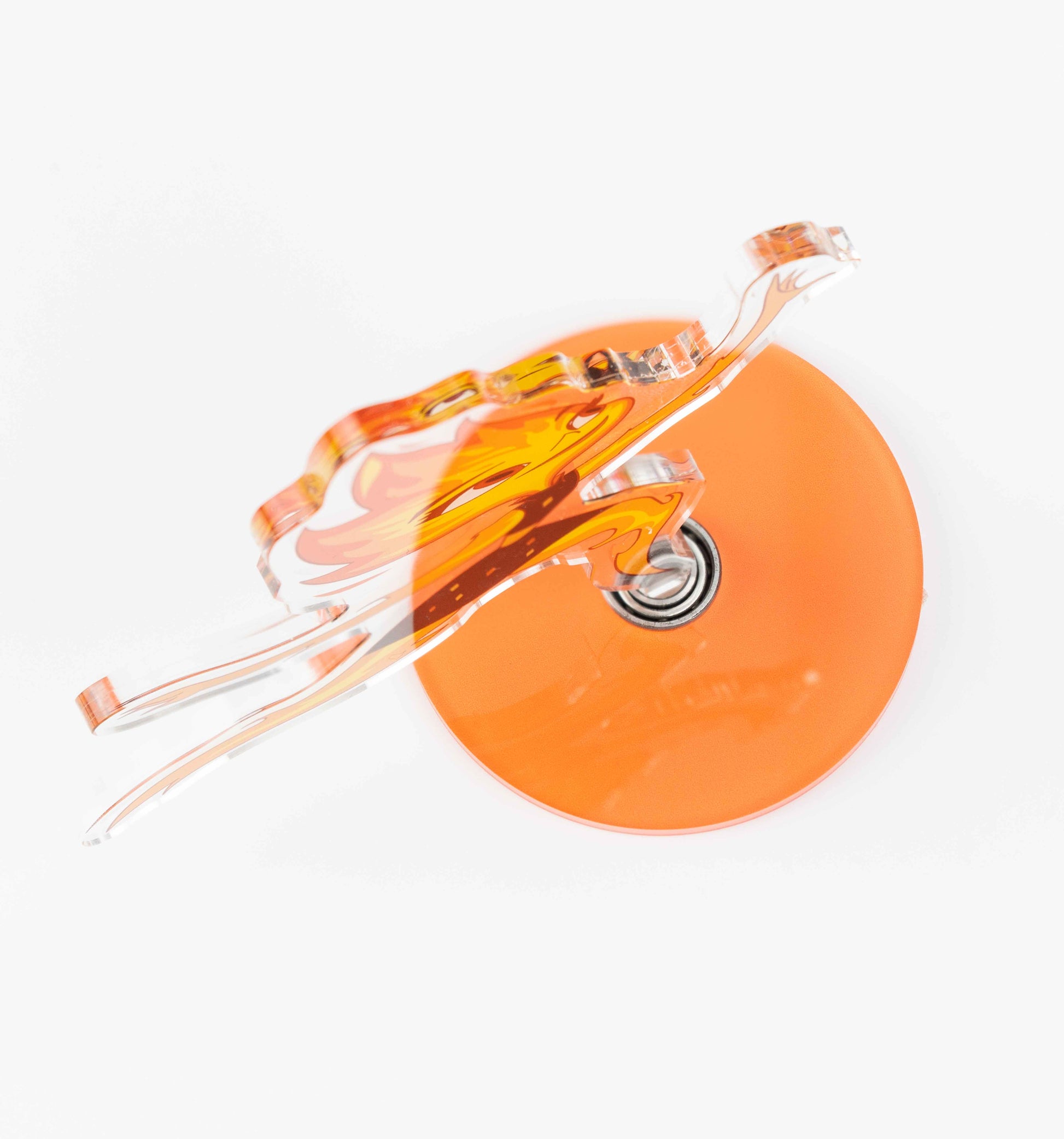 Rotating acrylic standee close‑up, metal swivel mechanism and orange acrylic base detail