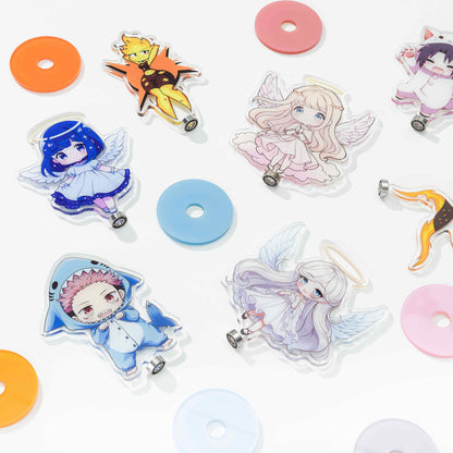 Assorted custom rotating acrylic standee parts, anime character cutouts and colorful round bases flat display