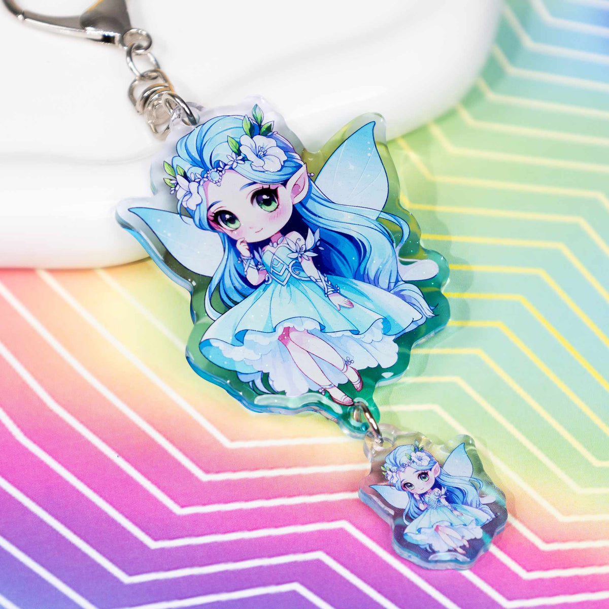 Two-piece linked acrylic bag charm with silver key ring, souvenir gift
