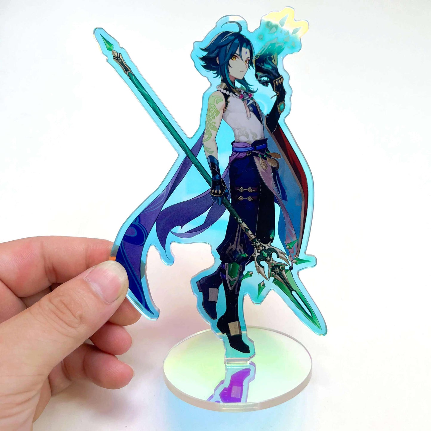 Close-up of a custom anime acrylic holographic rainbow standee