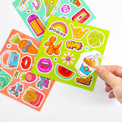 Premium kiss cut vinyl stickers with custom shapes and vibrant printing